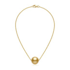 Studio shot of the genuine South Sea golden pearl floating pendant necklace on a clean white background.