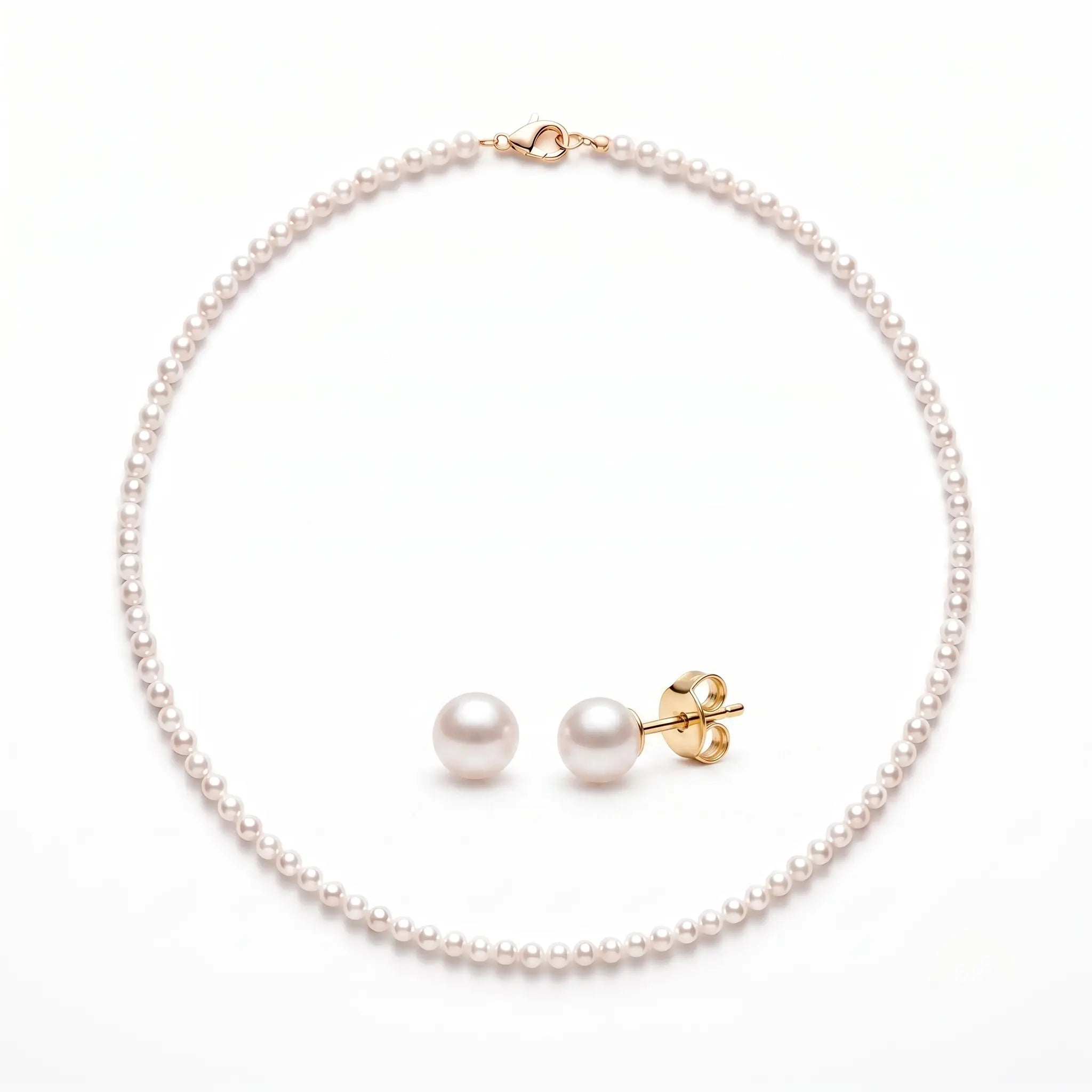 Solid gold freshwater pearl necklace and stud earrings set featuring hand-selected pearls with a classic minimalist design.