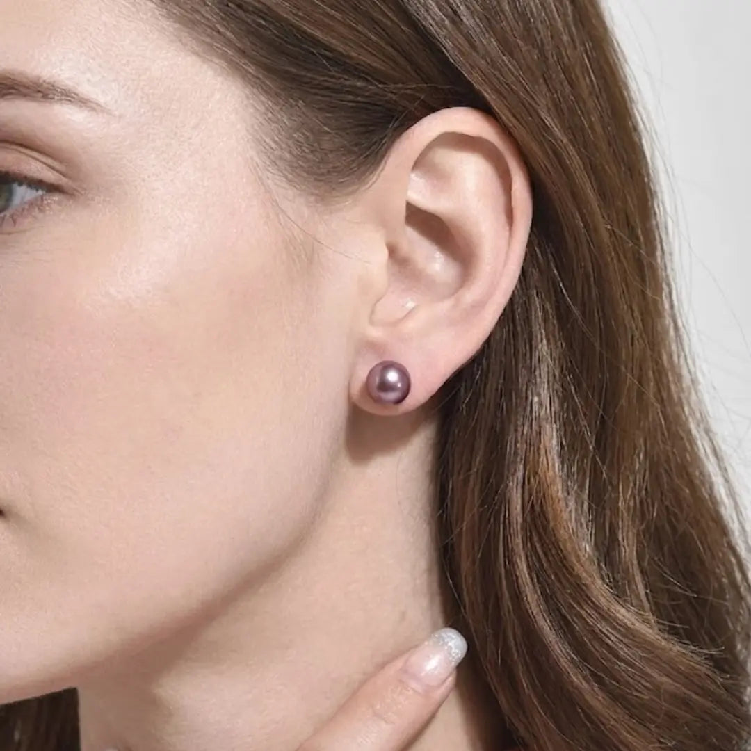 18K Gold Purple Pearl Stud Earrings on Display