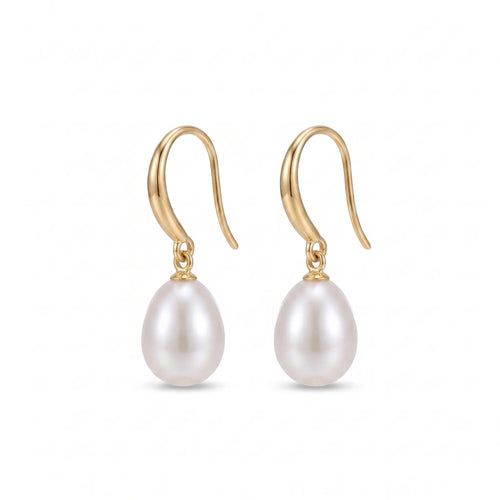 18K gold freshwater rice pearl earrings featuring premium elongated pearls with exceptional natural luster and a modern elegant silhouette.