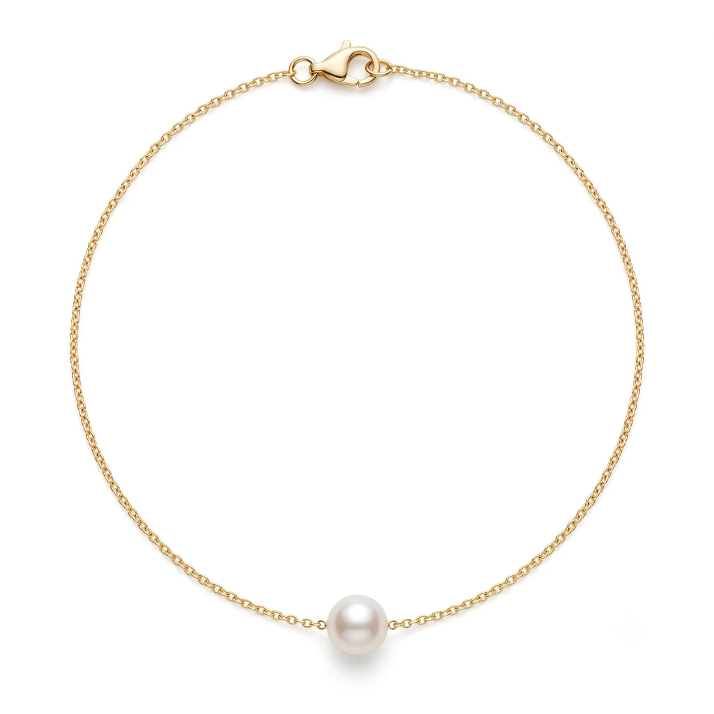 Close-up product shot of a 7-7.5mm genuine Japanese Akoya saltwater pearl pendant on an ultra-fine 18K solid yellow gold chain, isolated on a white background.