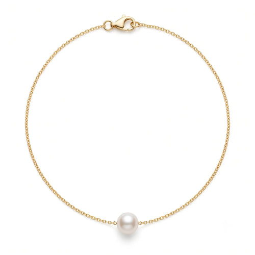 Close-up product shot of a 7-7.5mm genuine Japanese Akoya saltwater pearl pendant on an ultra-fine 18K solid yellow gold chain, isolated on a white background.