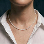 View of an ultra-fine 18K gold pearl station choker, demonstrating its clean, tailored profile without extension chains.