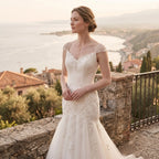 Bride wearing an 18K solid gold baroque pearl Y-lariat necklace for a modern romantic bridal jewelry look.