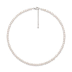 Mini freshwater seed pearl necklace featuring unique organic pearls with soft luster and a delicate minimalist design.