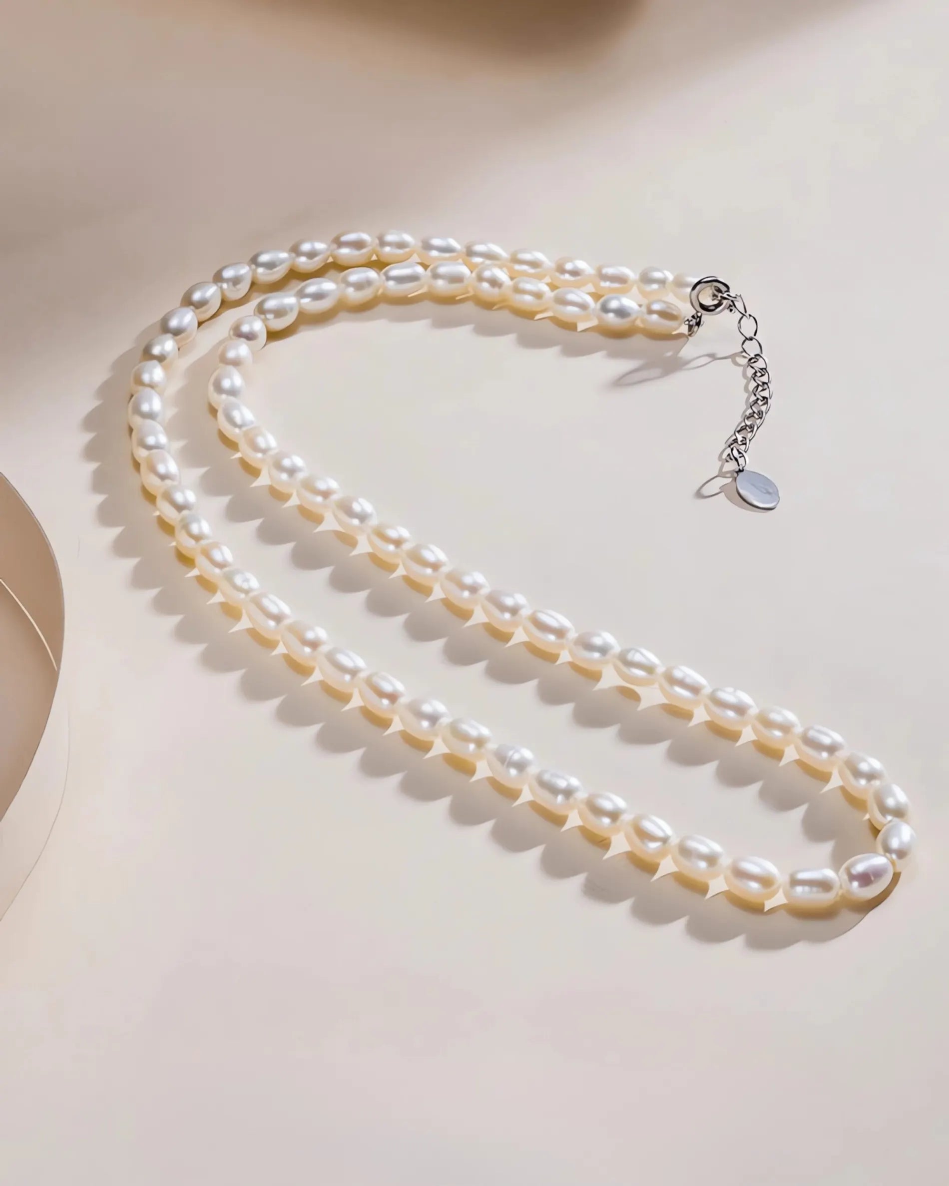 Alina Classic – AAA Aurora Warm Glow Rice Pearl Necklace in 925 Sterling Silver