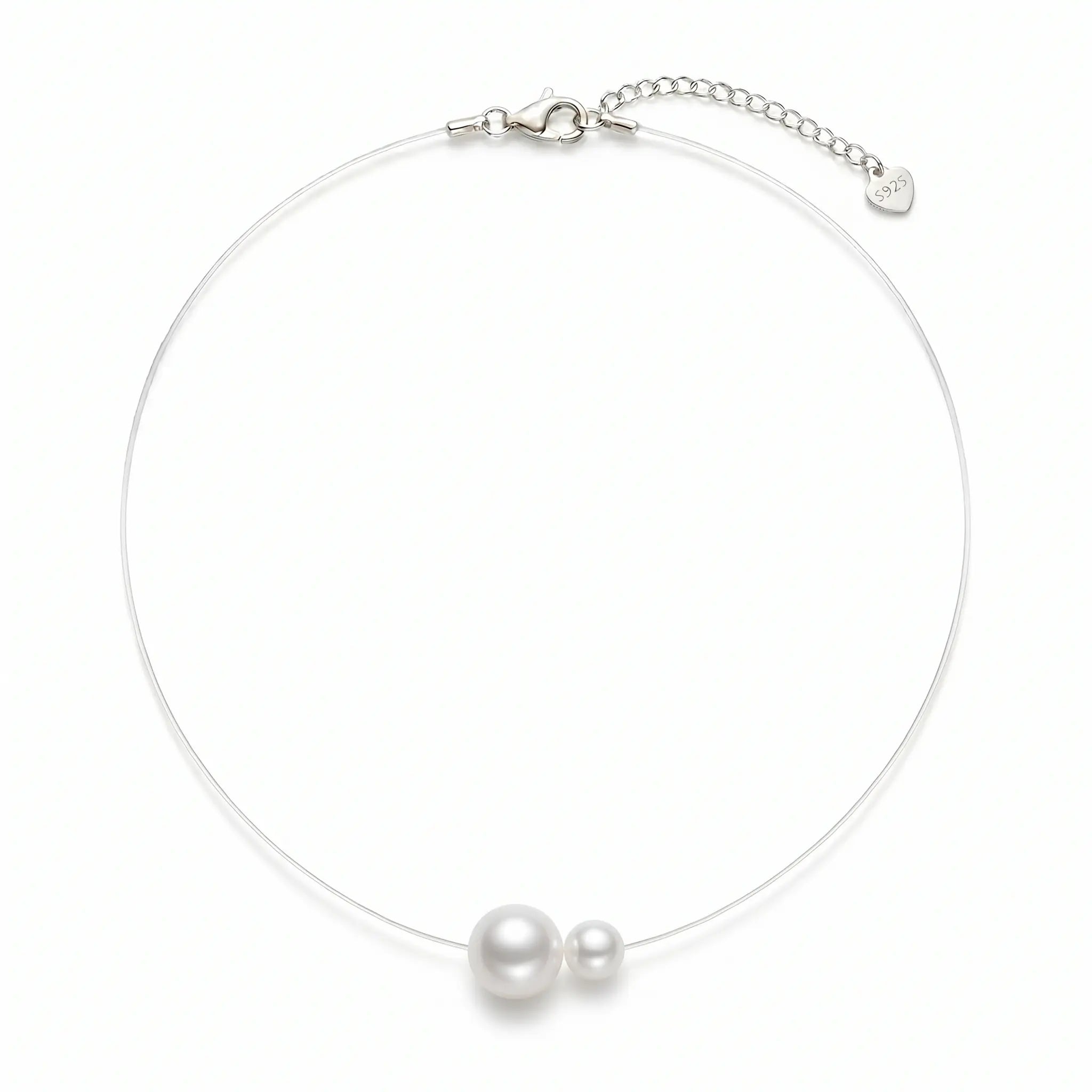 Minimalist floating illusion single pearl strand necklace with a tarnish-resistant clasp, front view studio shot.