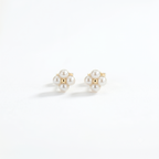 Dainty 18K solid gold berry pearl station earrings featuring tiny freshwater pearls with a delicate floating design.