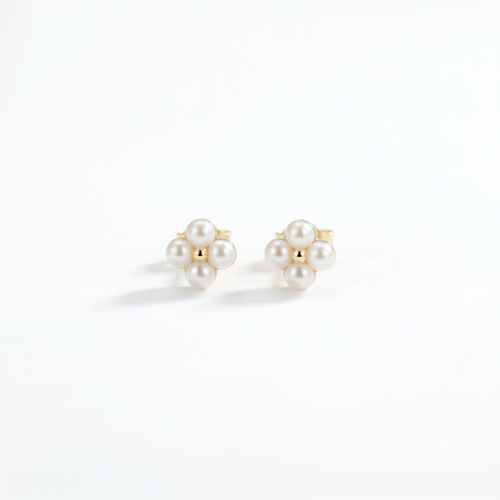 Dainty 18K solid gold berry pearl station earrings featuring tiny freshwater pearls with a delicate floating design.
