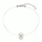 Studio shot of the invisible nylon thread solitaire pearl pendant necklace on a clean white background.