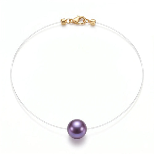 Studio still life of a pair of minimalist invisible floating single purple Edison pearl pendant necklaces, focusing on the rare natural metallic sheen.