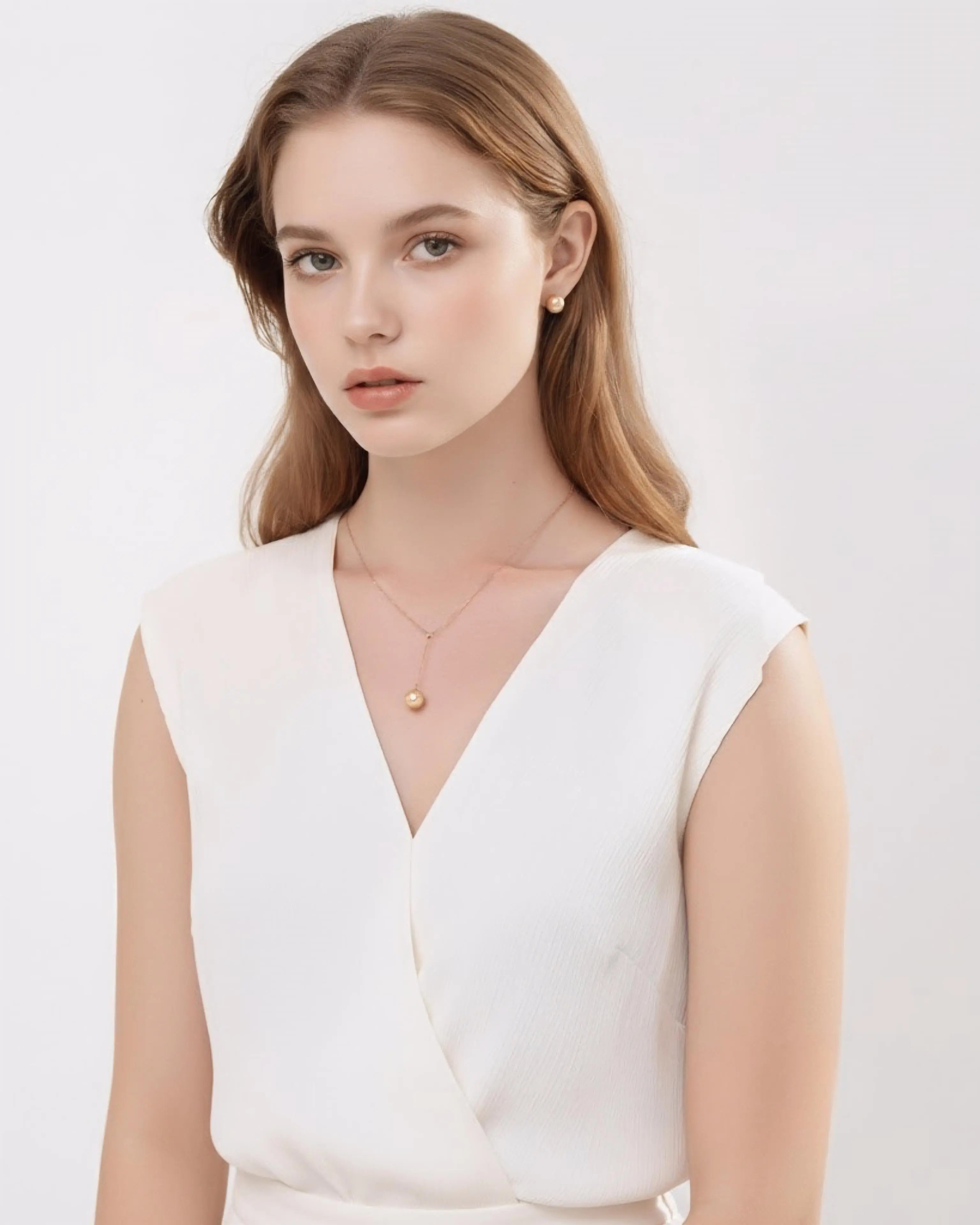 Solstice – AAA+ Quality South Sea Golden Round Pearl Pendant Necklace