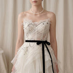 Radiant bride wearing a heavy multi-strand 3mm tiny pearl collar for an effortless old-money elegance bridal look.
